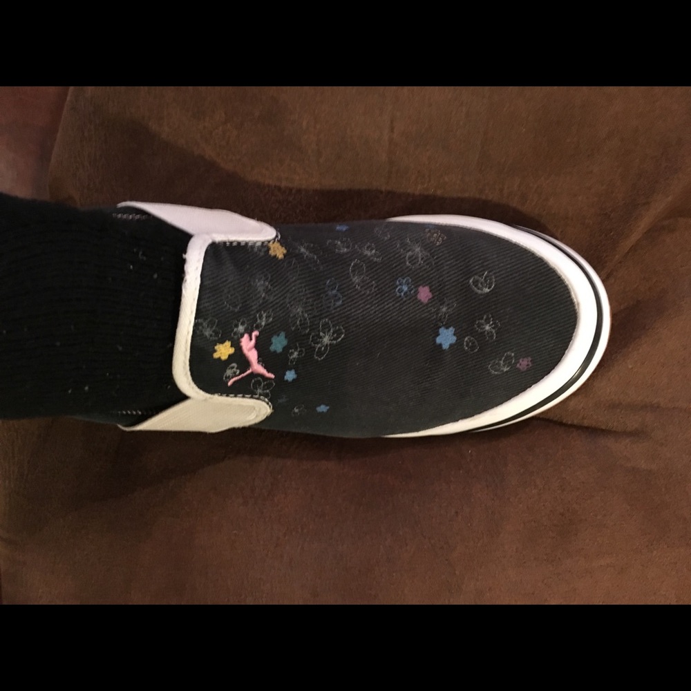 Puma tennis shoes faded black floral print